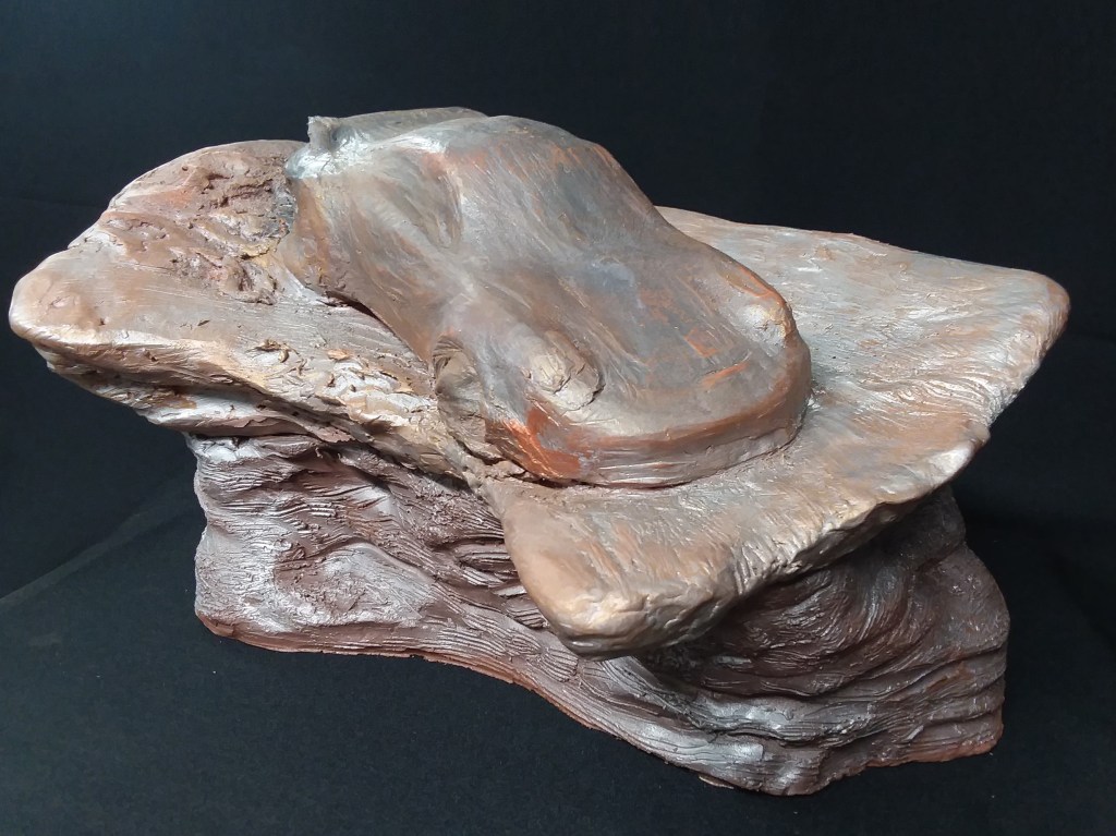 “LA RECTA LRP” 15″ x 10″ x 9″ terracotta with metallic patina. 21 lbs.