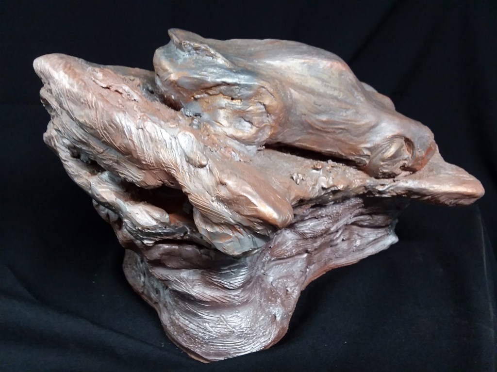 “LA RECTA LRP” 15″ x 10″ x 9″ terracotta with metallic patina. 21 lbs.