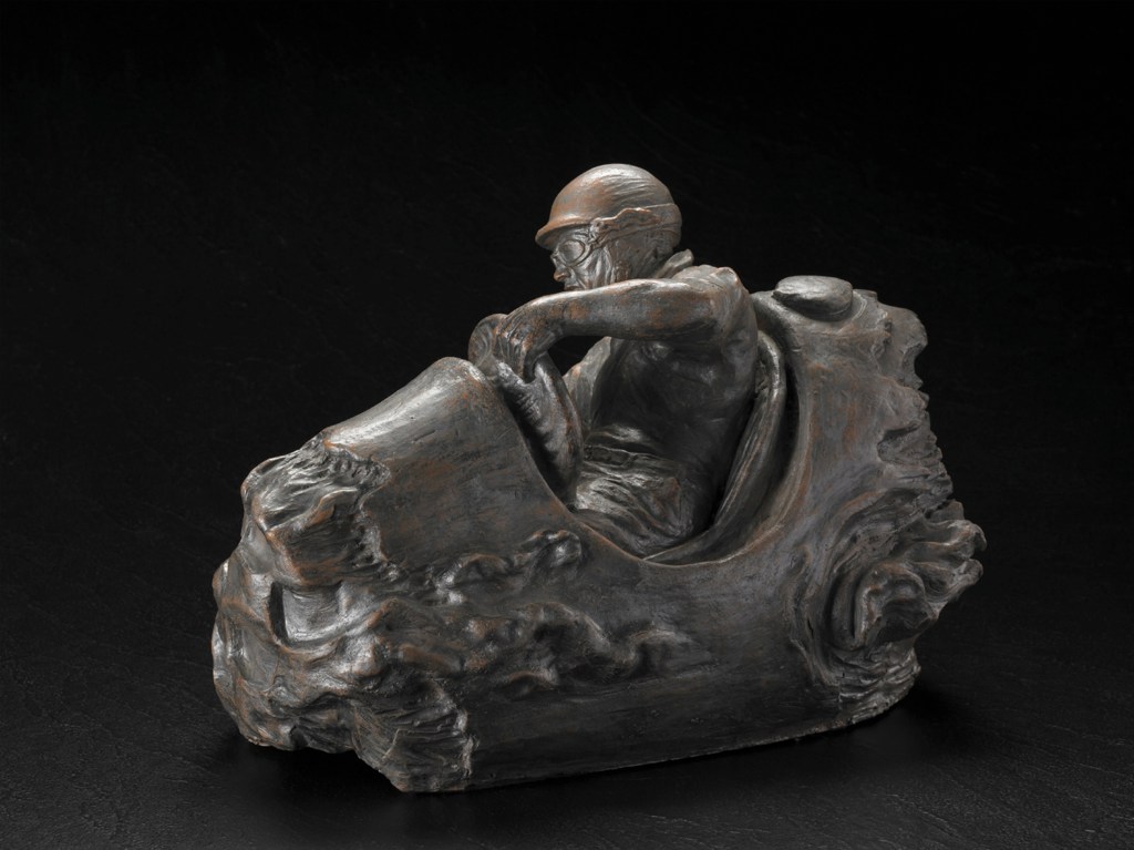 “PILOTO” 12″ x 11″ x 12″ terracotta with metallic patina. 38 lbs. $NFS. Bronze edition estimate $9,500